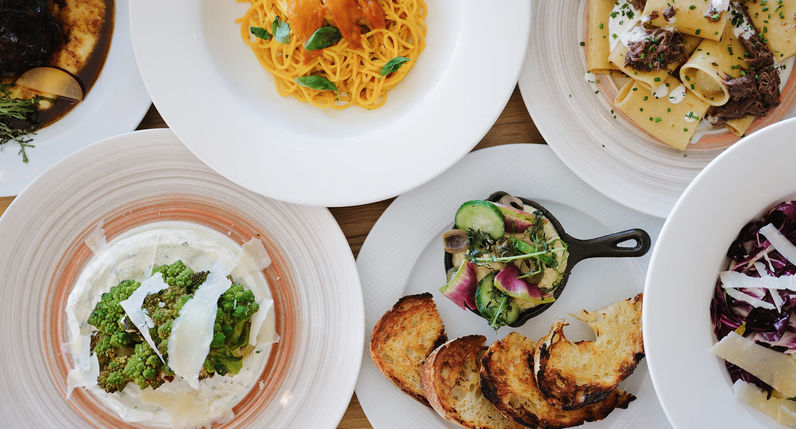 Six dishes featuring the menu at Carbon Beach Club at Malibu Beach Inn