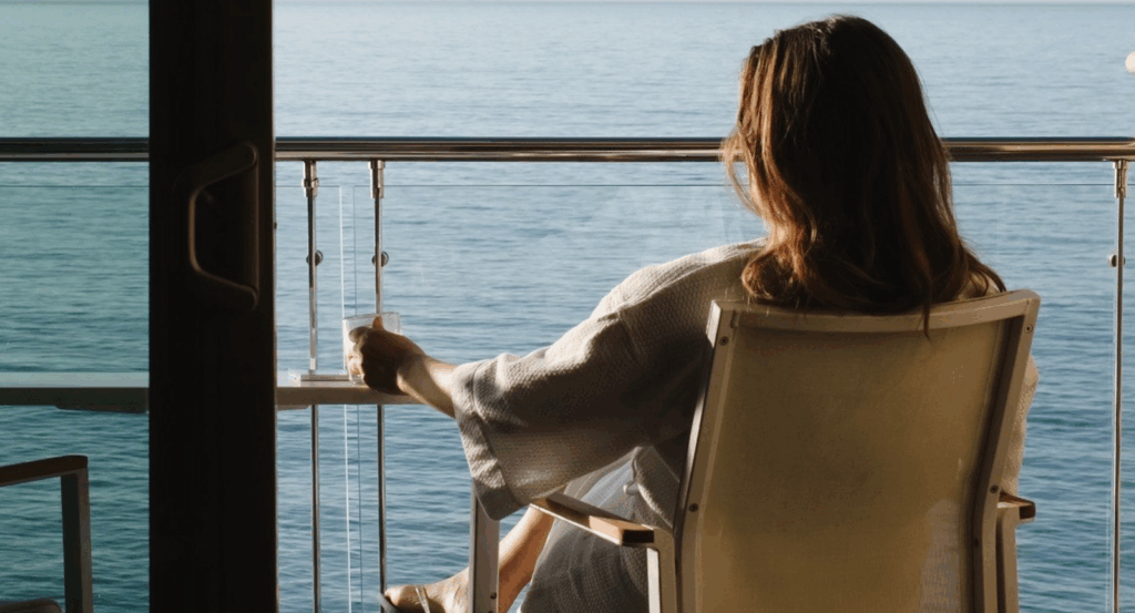 woman sitting on the balcony 